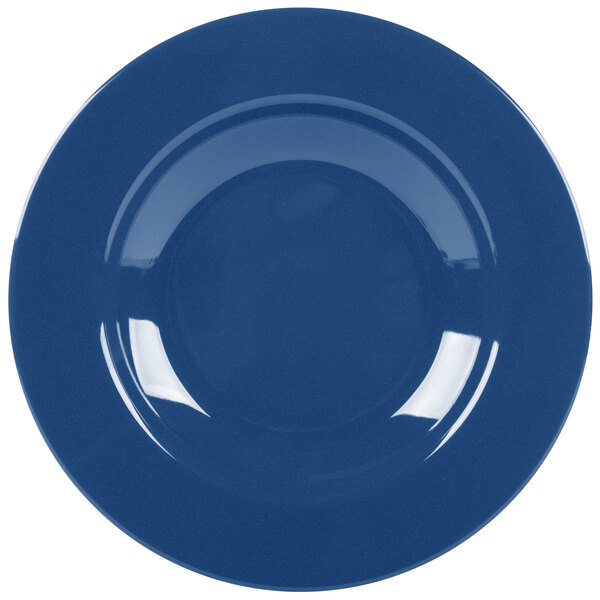 A close-up of a Texas Blue melamine bowl with a white interior.