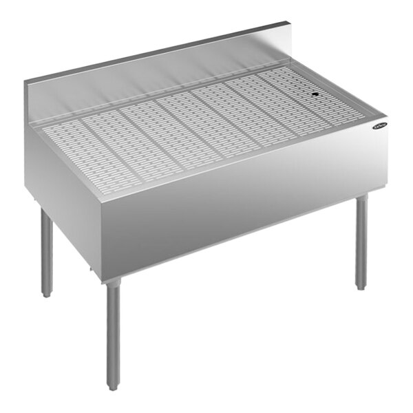 A Krowne stainless steel underbar drainboard with a metal grate.