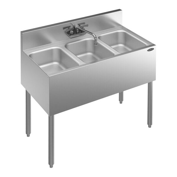 A stainless steel Krowne underbar sink with three bowls and a faucet.