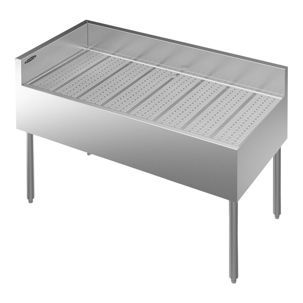 A Krowne stainless steel underbar corner drainboard with a left return.