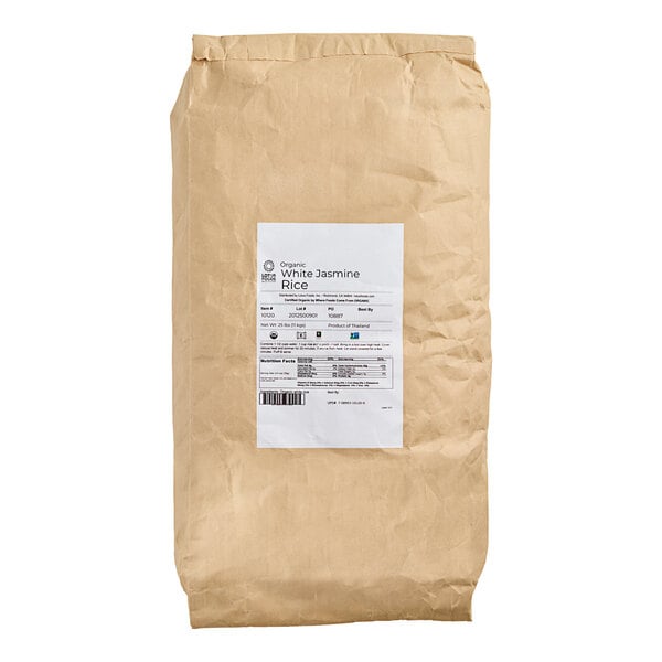 A brown bag with a white label of Lotus Foods Organic Long Grain White Jasmine Rice.