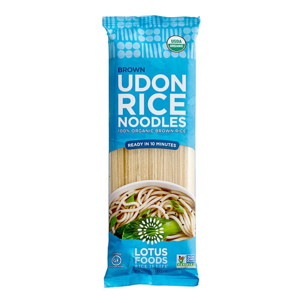 A white bag of Lotus Foods Organic Brown Udon Rice Noodles with text on it.