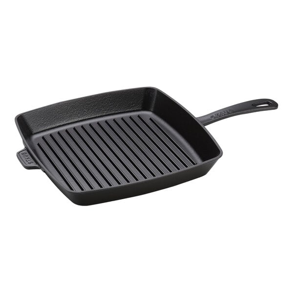 A black square Staub grill pan with a grid pattern.