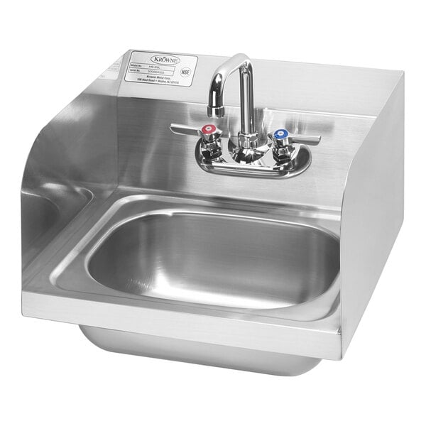 A Krowne stainless steel wall-mounted hand sink with side splashes and a faucet.