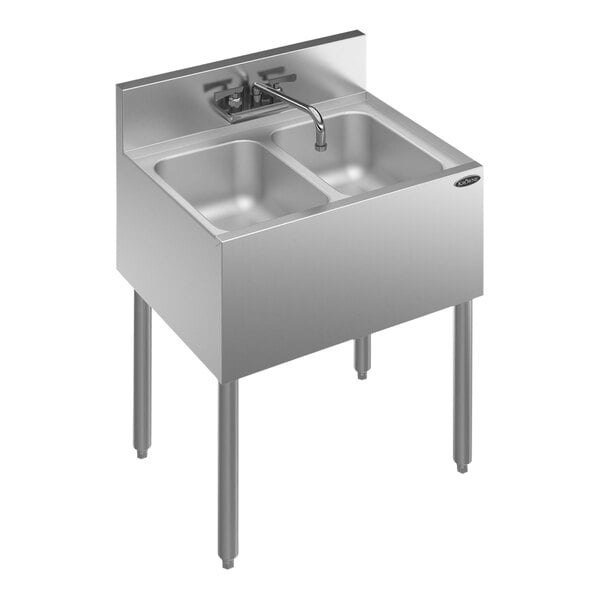 A Krowne stainless steel underbar sink with two bowls and a faucet.