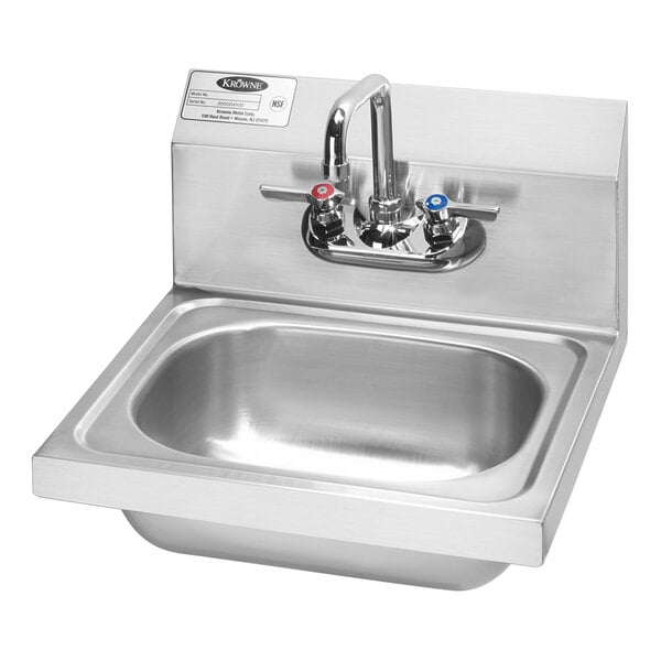 A Krowne stainless steel wall-mounted hand sink with a faucet.