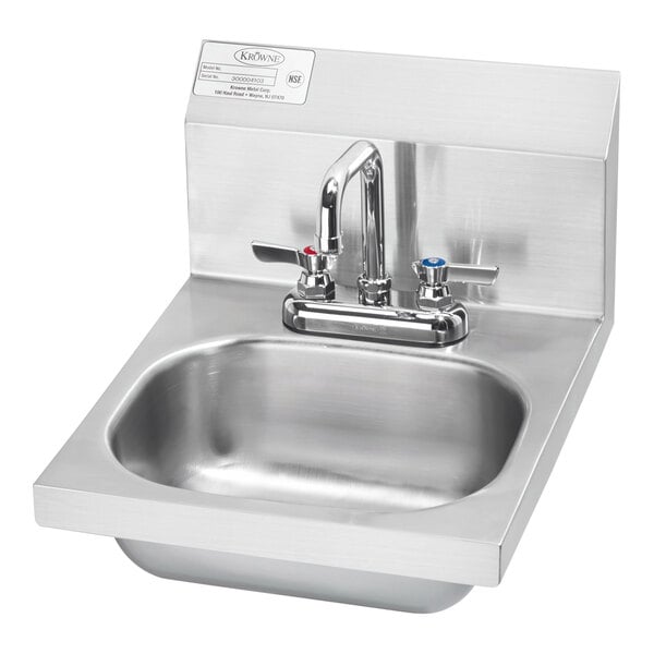 A stainless steel Krowne wall-mounted hand sink with a faucet.