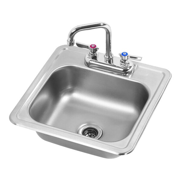 A Krowne stainless steel drop-in sink with a faucet.