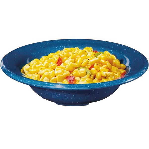 A Texas Blue melamine bowl filled with corn on a table with a plate of food.