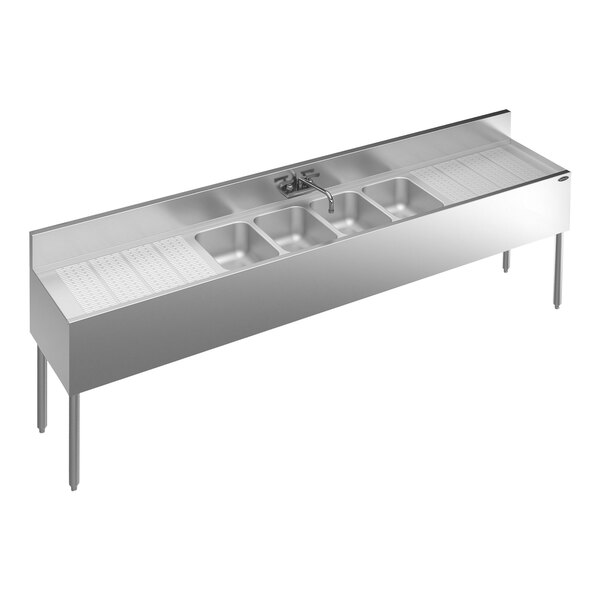 A stainless steel Krowne Royal Series underbar sink with 4 bowls, a faucet, and 2 drainboards.