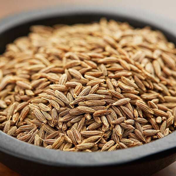 A bowl of brown Regal Cumin Seeds.
