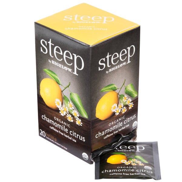 A box of Steep By Bigelow organic chamomile citrus tea bags with a yellow lid on a counter.