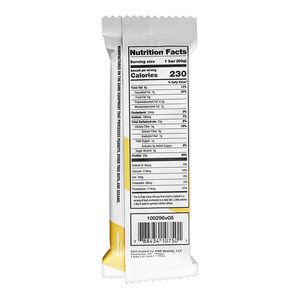 A ONE Cinnamon Roll Protein Bar package with yellow and black labels.