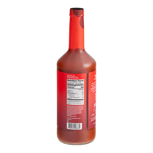 A bottle of Q Mixers Premium Bloody Mary Mix with a label on it.