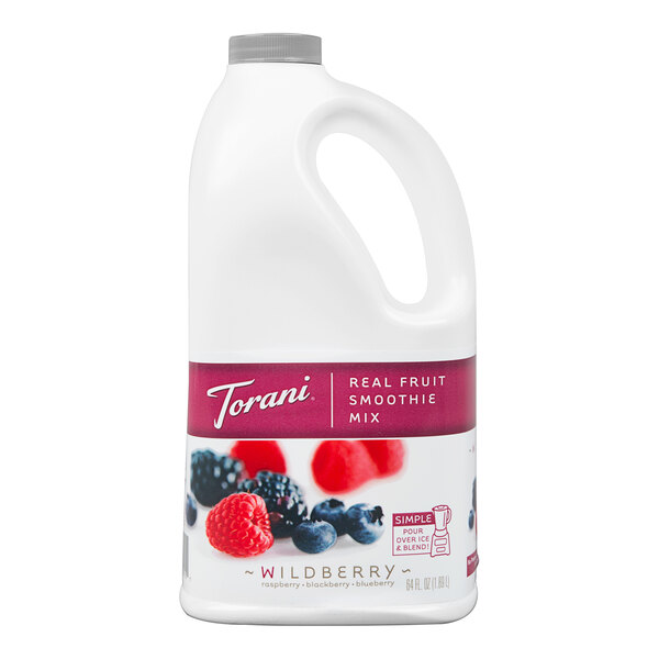 A white jug of Torani Wildberry Fruit Smoothie Mix with a label.