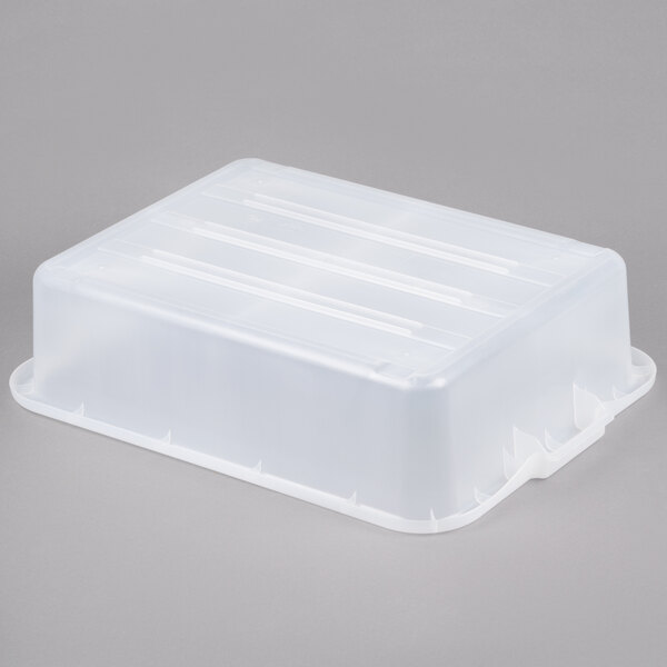 A clear Vollrath Color-Mate bus tub.