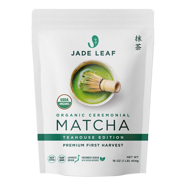 A white resealable bag labeled 'Jade Leaf Organic Ceremonial Matcha Teahouse Edition' with an image of a bowl of green matcha and a bamboo whisk on the front.