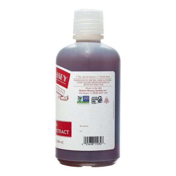 A close-up of a Nielsen-Massey Mexican Vanilla Extract bottle with a white label.