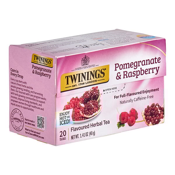 A box of Twinings Pomegranate & Raspberry Herbal Tea Bags with a label.
