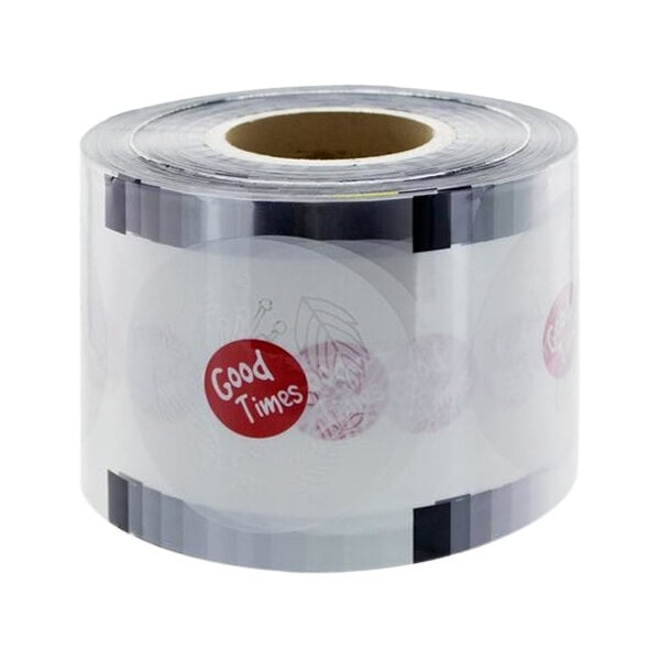 A roll of plastic sealing film with a red and white Good Times sticker.