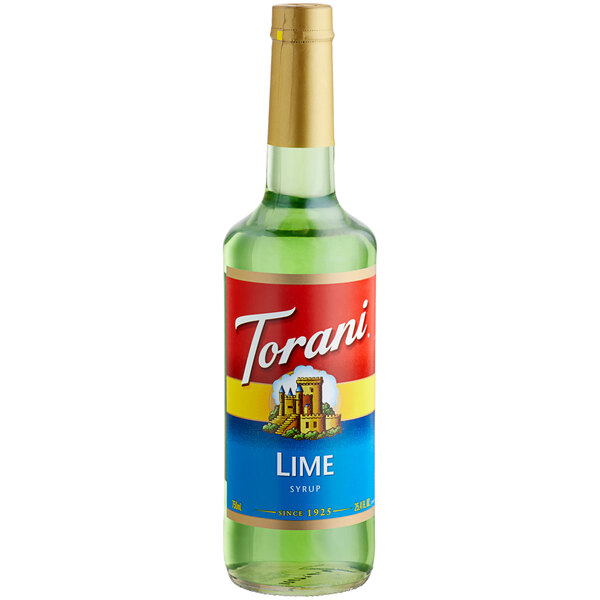 A Torani Lime Fruit Syrup bottle with a label.