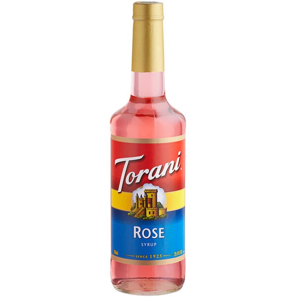 A Torani 750 mL glass bottle of pink rose flavoring syrup.