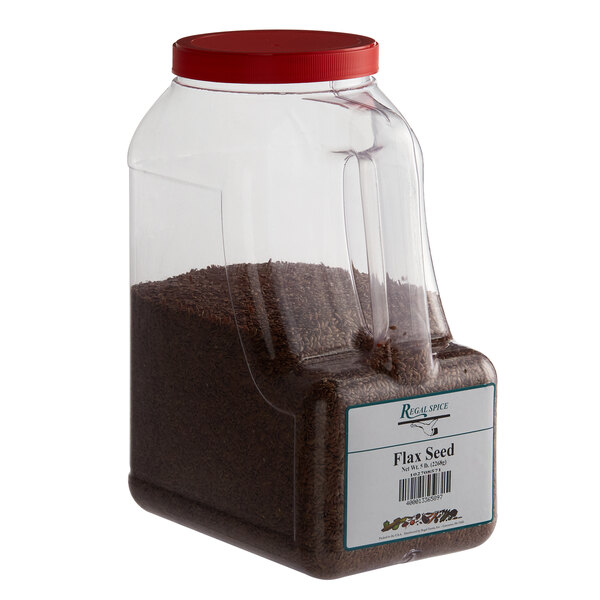 A plastic jug of Regal Brown Flax Seed with a red lid.