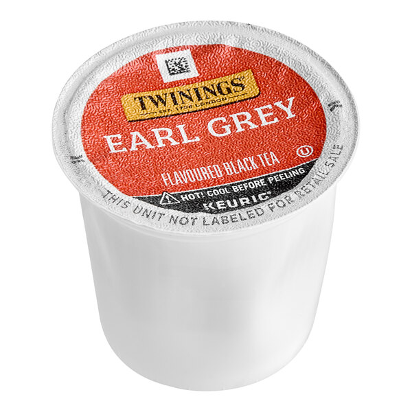 A white Twinings container of Earl Grey Tea K-Cup pods with a red and black label.