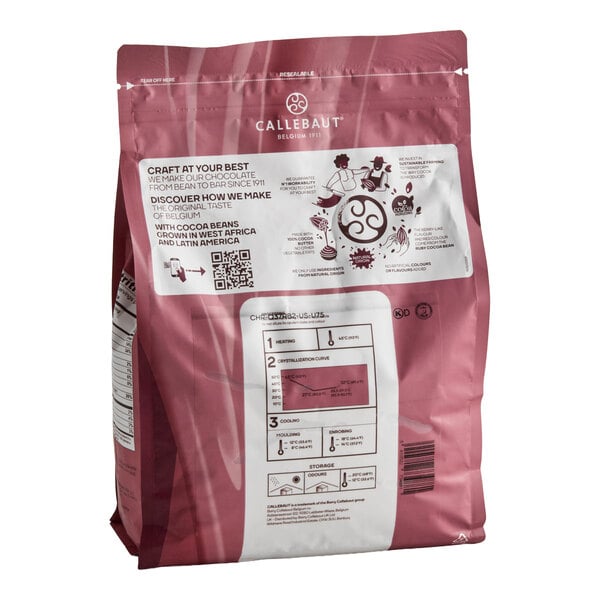 A pink resealable bag of Callebaut RB2 Ruby Couverture Callets weighing 5.5 pounds.