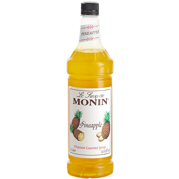 A Monin bottle of pineapple syrup.