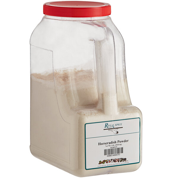 A plastic container of Regal Horseradish Powder with a red lid.
