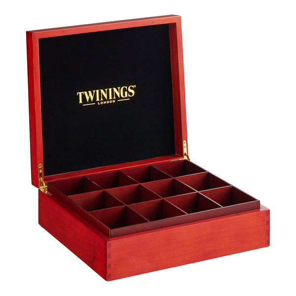 A red Twinings wooden tea chest with 12 compartments.