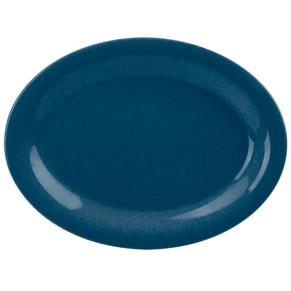 A blue oval platter with a white surface and speckled rim.