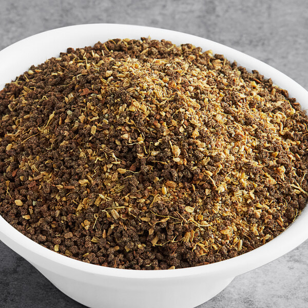 A bowl of brown and white David Rio Masala Chai loose leaf tea.