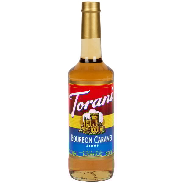 A Torani Bourbon Caramel flavoring syrup 750 mL glass bottle with a red label.