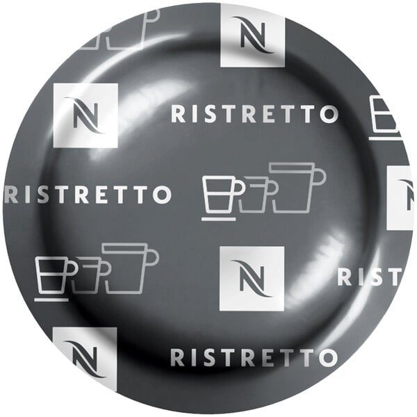 A Nespresso Professional coffee cup filled with ristretto coffee on a saucer.