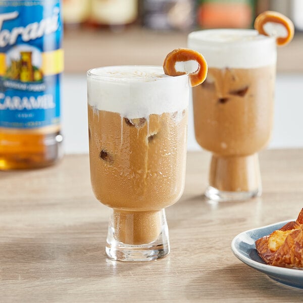 A glass of coffee with Torani Sugar-Free Caramel Flavoring Syrup.