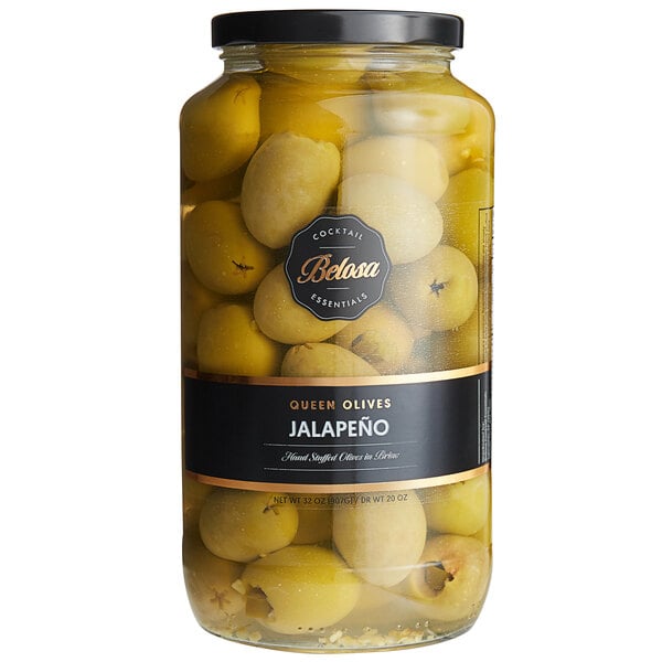 A jar of Belosa jalapeno stuffed green olives with a label.