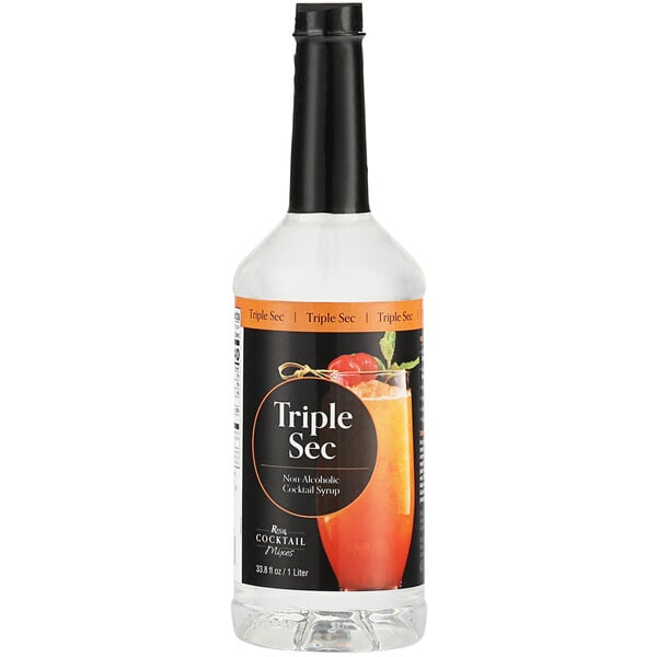 A case of 6 black labeled Regal Cocktail Triple Sec Syrup bottles.