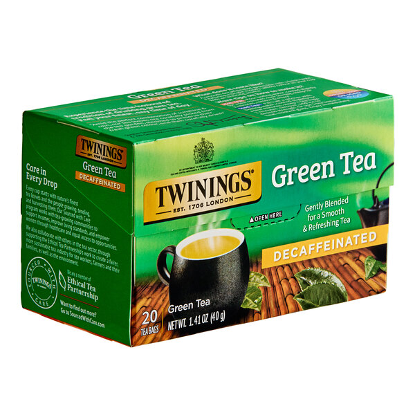 A green box of Twinings green decaffeinated tea bags on a white background.