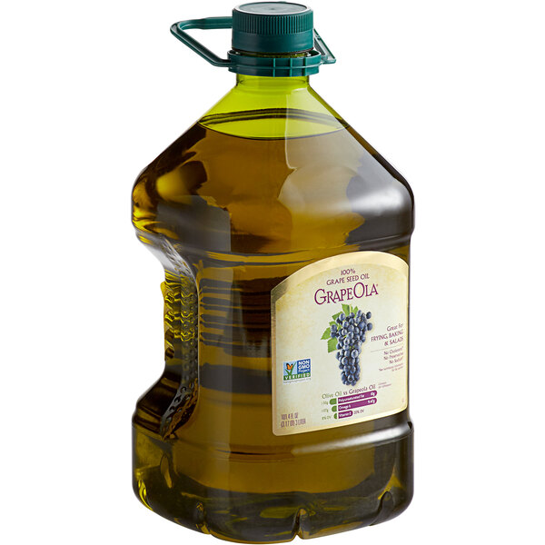A large bottle of Grapeola grape seed oil with grapes on it.