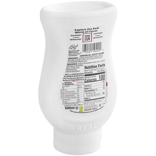 A white plastic container of Real Raspberry Puree Infused Syrup with black and red text.