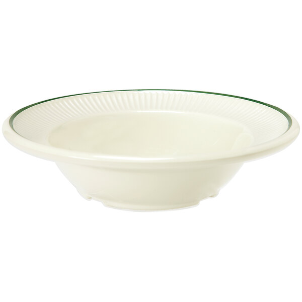 A white bowl with a green rim.