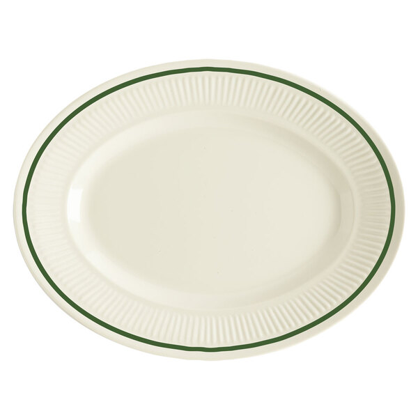 A white oval platter with a green rim.
