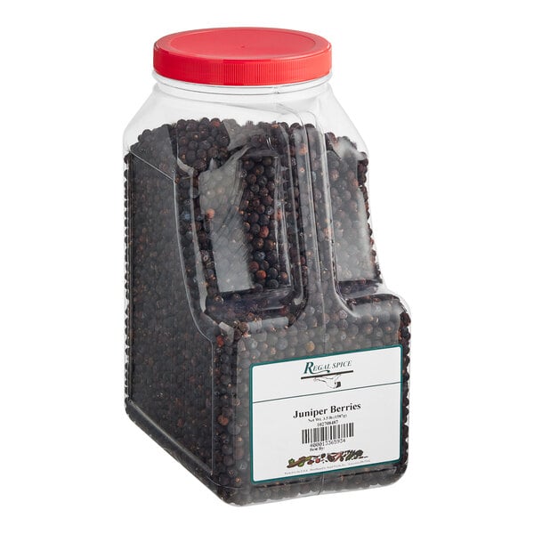 A white plastic container of Regal juniper berries with a black lid.