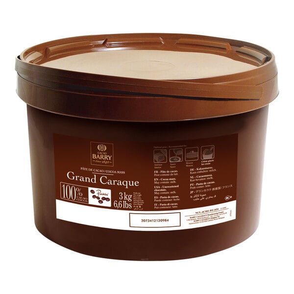 A white bucket of Cacao Barry Grand Caraque cocoa mass.