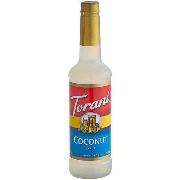A Torani plastic bottle of coconut syrup with a red label.
