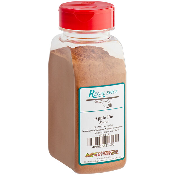 A plastic container of Regal Apple Pie Spice, a brown powder.