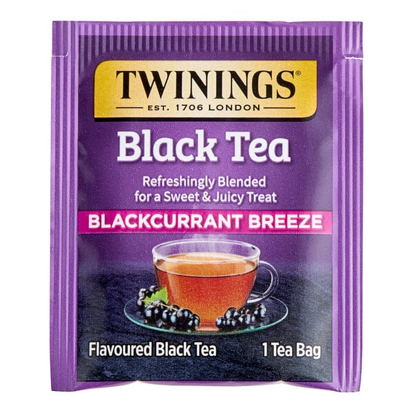 A purple package of Twinings Blackcurrant Breeze Tea Bags.