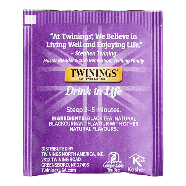A purple packet of Twinings Blackcurrant Breeze Tea Bags.